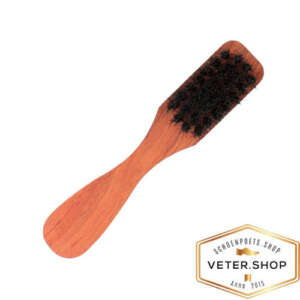 Deze schoenpoetsborstel heeft een handzaam handvat voor een perfect glans resultaat